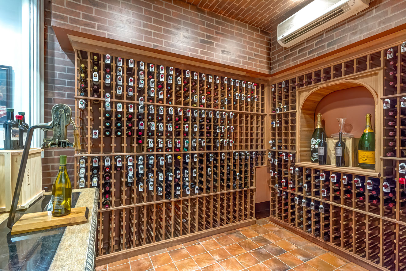 Residential interior wine cellar photography by Jesse Samples Allen Tate Realtors